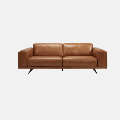 Brown leather sofa with wide block arms and angled feet